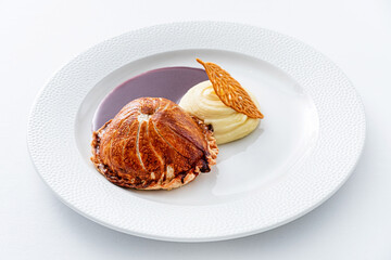 ..Tenderloin with pork, mushrooms and sirloin puff pastry on a white background. Homemade meal for wellington.