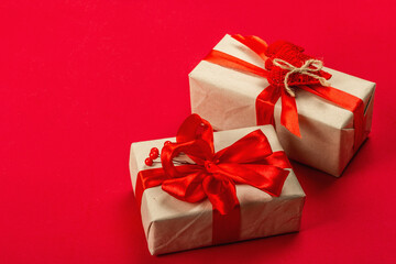 Gift concept in red colors. New Year or Christmas, festive mood