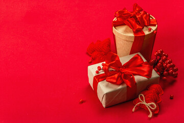 Obraz premium Gift concept in red colors. New Year or Christmas, festive mood