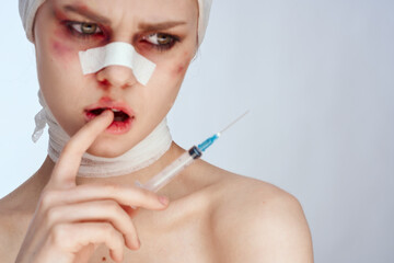 woman woman after surgery syringe in hand injection studio lifestyle