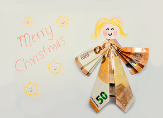 Merry Christmas card with angel, made of two 50 Euro € folded bank notes