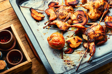 Quail fried on skewers