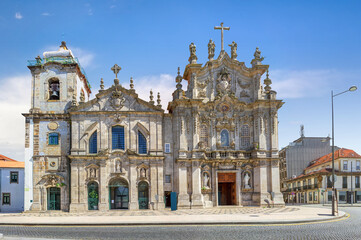 Carmo and Carmelitas churches look like the biggest church in the city. In fact, they are two churches separated by one of the world as narrowest houses. Porto. Portugal
