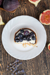 tartlet with cream and blueberries
