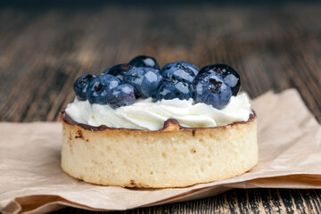 tartlet with chocolate and buttercream with blueberries