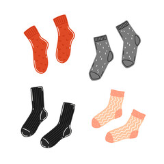 Set of warm knitted socks. Seasonal autumn or winter clothes. Vector flat illustration