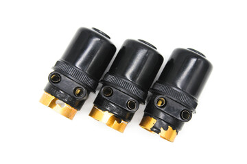 Bulb holders on white background with selective focus