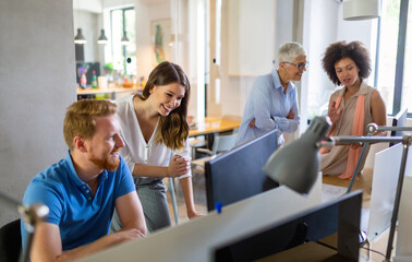 Group of happy business people working as a team at the office on meeting.