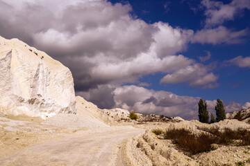White chalk mountain, quarry against the blue sky