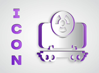 Paper cut Radioactive cargo train wagon icon isolated on grey background. Freight car. Railroad transportation. Paper art style. Vector