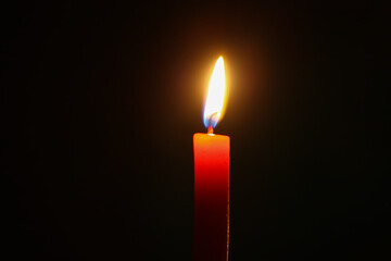 Red burning candle. 