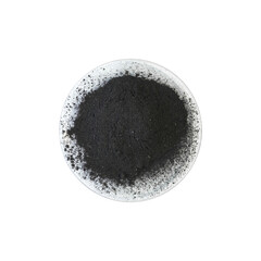 Carbon Charcoal Powder in Chemical Watch Glass. Close up chemical ingredient on white laboratory...