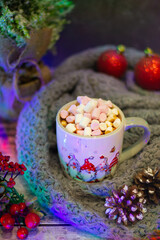 Dive into the winter holiday mood with this beautifully detailed mug, complemented by the season's treasures like crimson berries, pinecones, and an embracing woven warmth.