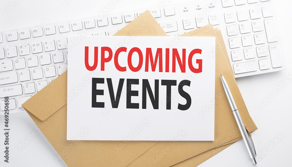 Poster text upcoming events on the envelope on the keyboard