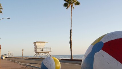 Pacific ocean beach, Oceanside California USA. Ball, lifeguard tower, life guard watchtower hut and...
