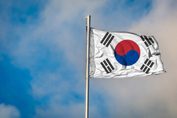 A Flag of South Korea (Republic of Korea) flying on a Flagpole against the Sky