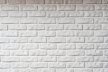 Whie textured rough brick wall horizontal photo close up texture background