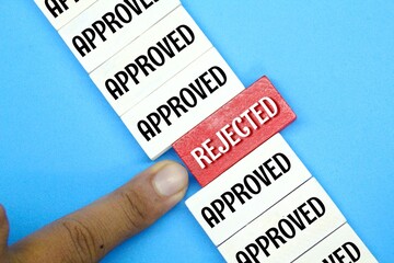 colored boards with the word approved and one word rejected. Approved And rejected