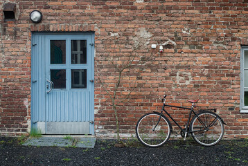 Fototapeta na wymiar Bike by the Blue Door