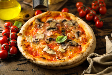 Traditional homemade pizza with mushroom and ham