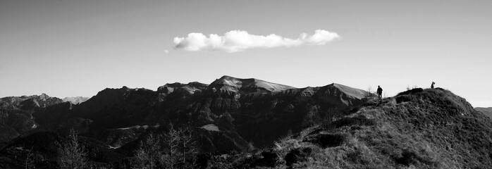 Sunny day on dolomites,  walking on the ridge