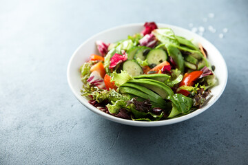 Healthy vegetable salad with avocado
