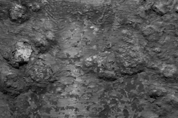 Fototapeta na wymiar evocative black and white image of rusty iron surface texture 
