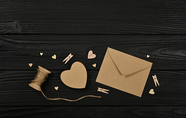Preparing Valentine gifts on black wooden table
