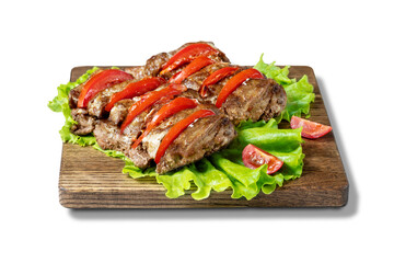Slices of pork steak  with paprika on wooden board isolated on white.