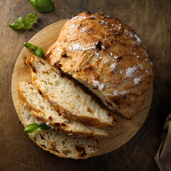 Homemade cheese tomato bread on a desk