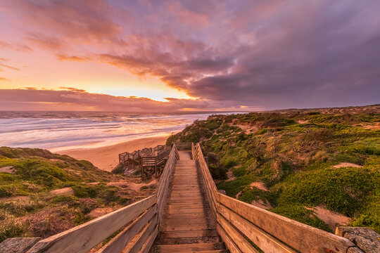 Woolamai Surf Beach boardwalk at moody sunset - Powered by Adobe