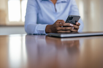 Picture of adult African-American woman, checking her appointments