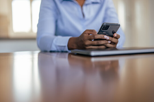 Picture of adult African-American woman, checking her appointments
