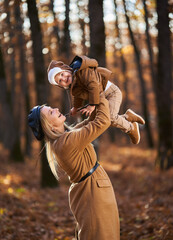 Mother and son in the forest
