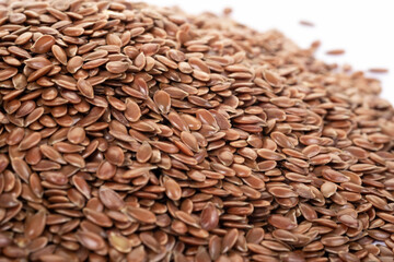 Flex seeds on white background. Healthy food concept.