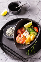 Buddha bowl, poke with salmon for dinner