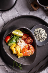 Buddha bowl, poke with salmon for dinner