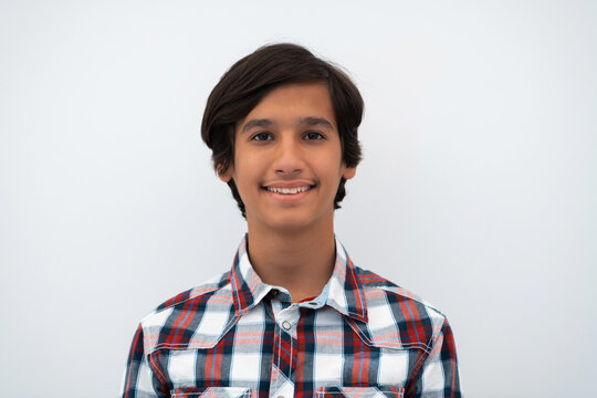 a portrait of a young attractive Arab boy isolated on a white background
