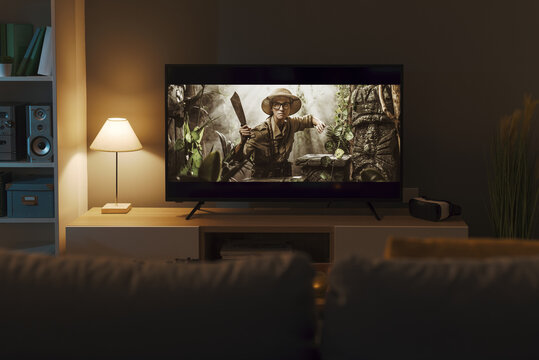 Adventure movie on a widescreen TV