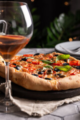Freshly baked pizza on a wooden board
