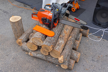 Two Chainsaws Logs