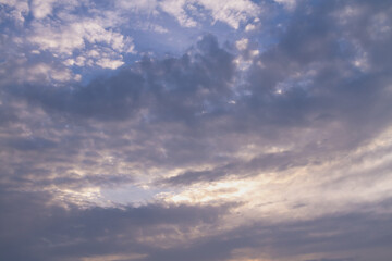 Beautiful cloudy sky with delicate, pastel clouds in the evening