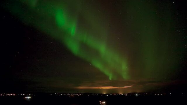 Northern Lights lighting up the night sky - wide shot