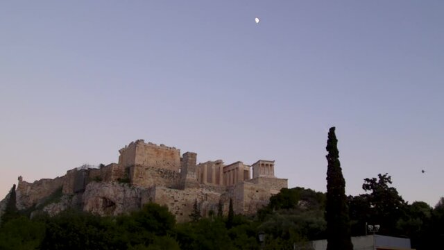 The moon over the Parthenon in Athens, Greece.