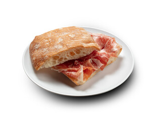 Jamón ibérico  con  pan sobre fondo blanco. Desayuno de España. Iberian ham sandwich on white background. Breakfast from Spain.