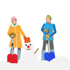 雪だるまを作る夫婦