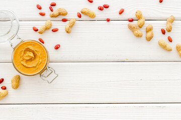 Homemade creamy peanut butter with nuts, top view
