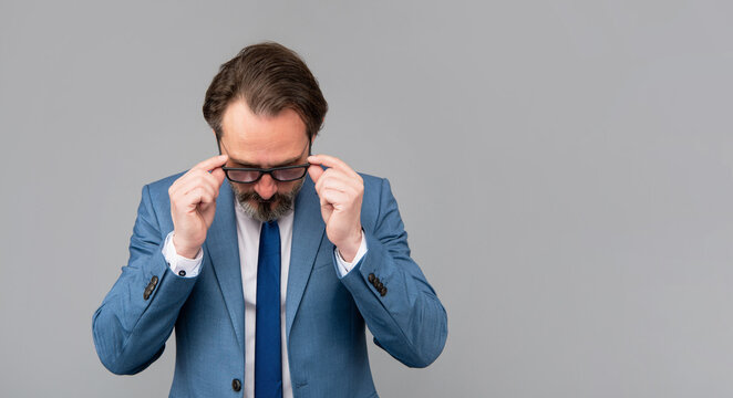 man look through eyeglasses. vision acuity and eyesight. vision correction for eye health.