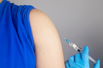 Concept. Chipping through vaccinations. Government conspiracy. Vaccination and implantation of a tracking microchip into the human body. Implantation of electronic technologies into the human body