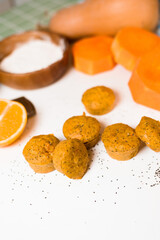 pumpkin cupcakes in a baking dish with chia seeds, autumn orange pie with orange.